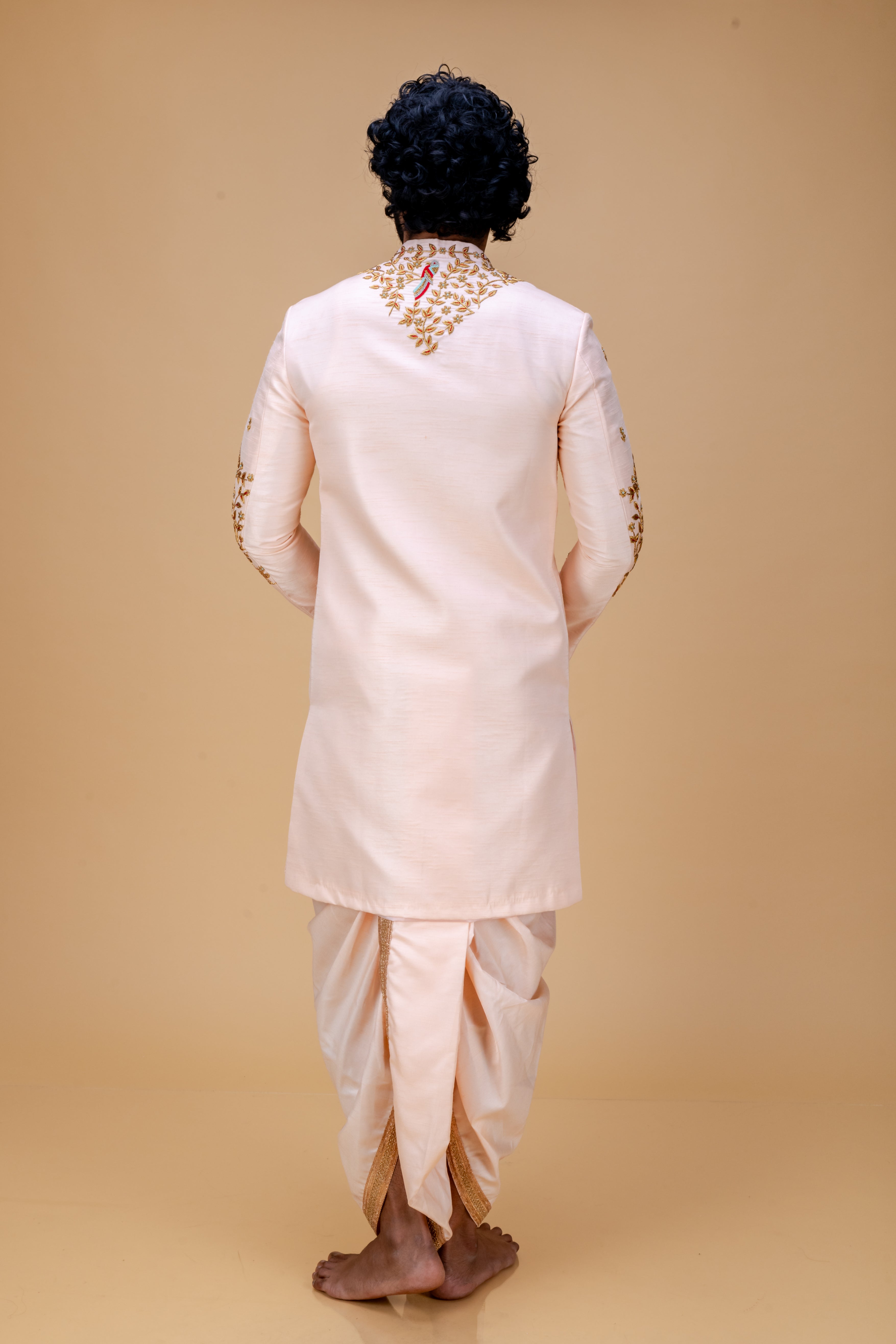 Peach handworked sherwani and dhoti set
