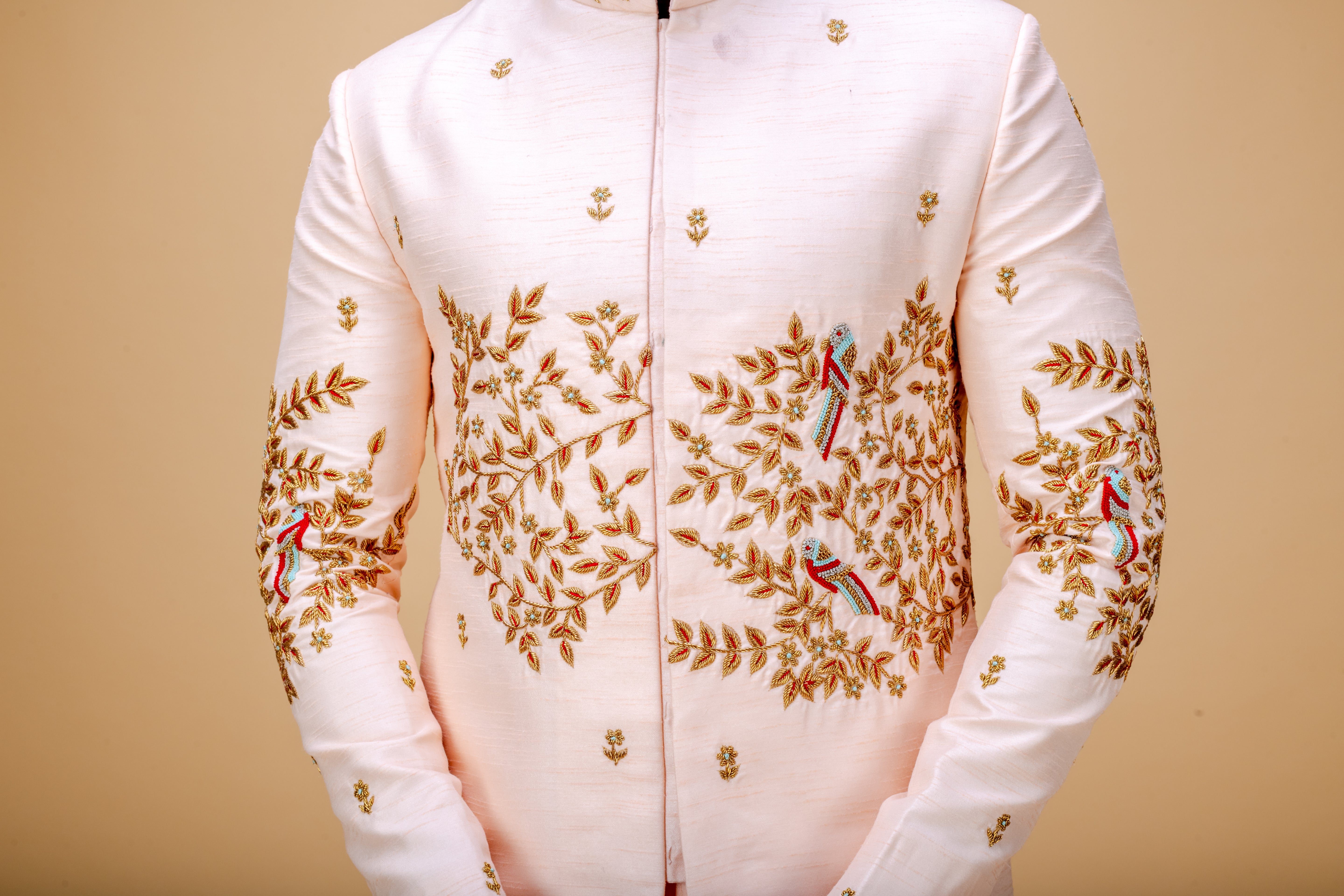 Peach handworked sherwani and dhoti set