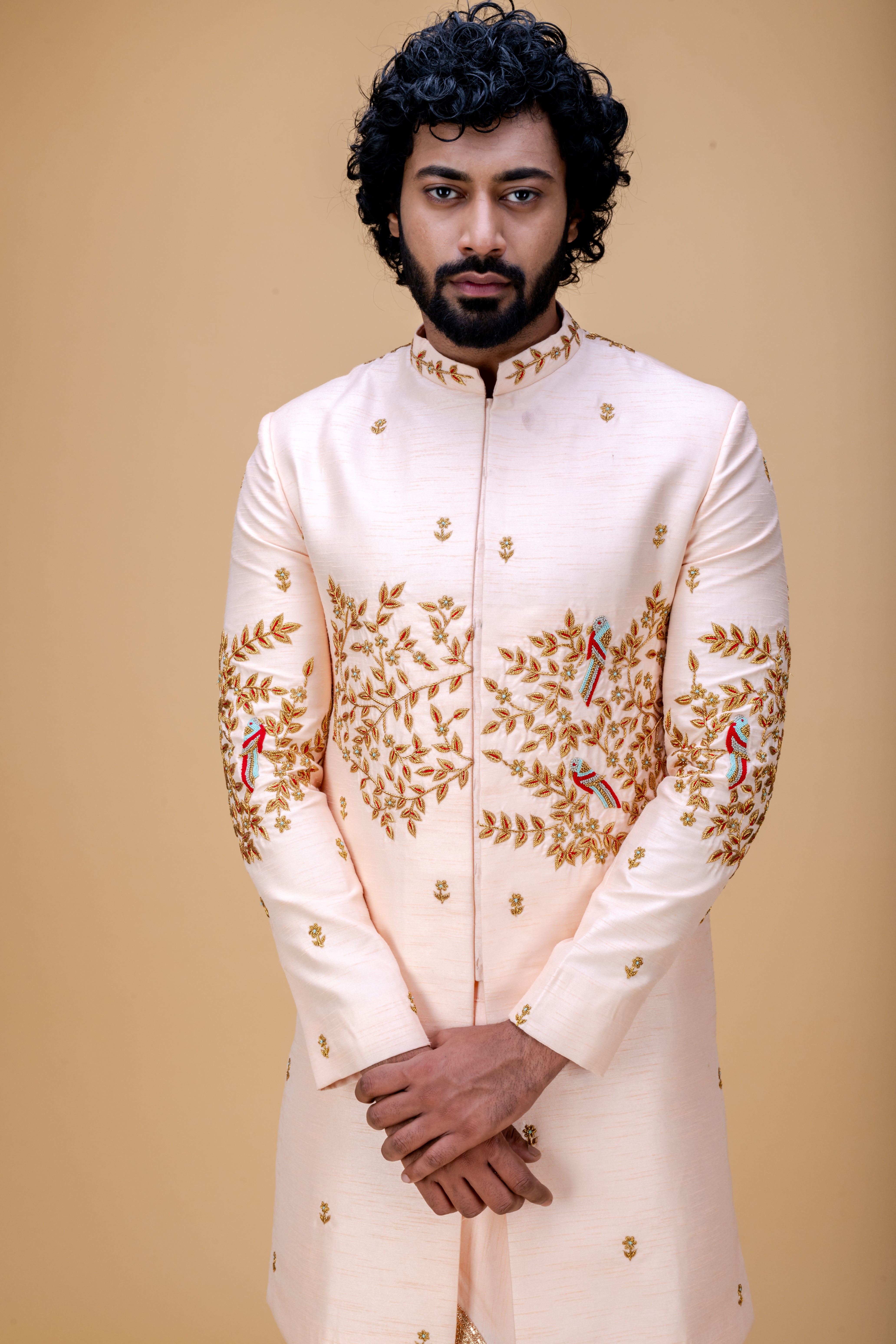Peach handworked sherwani and dhoti set