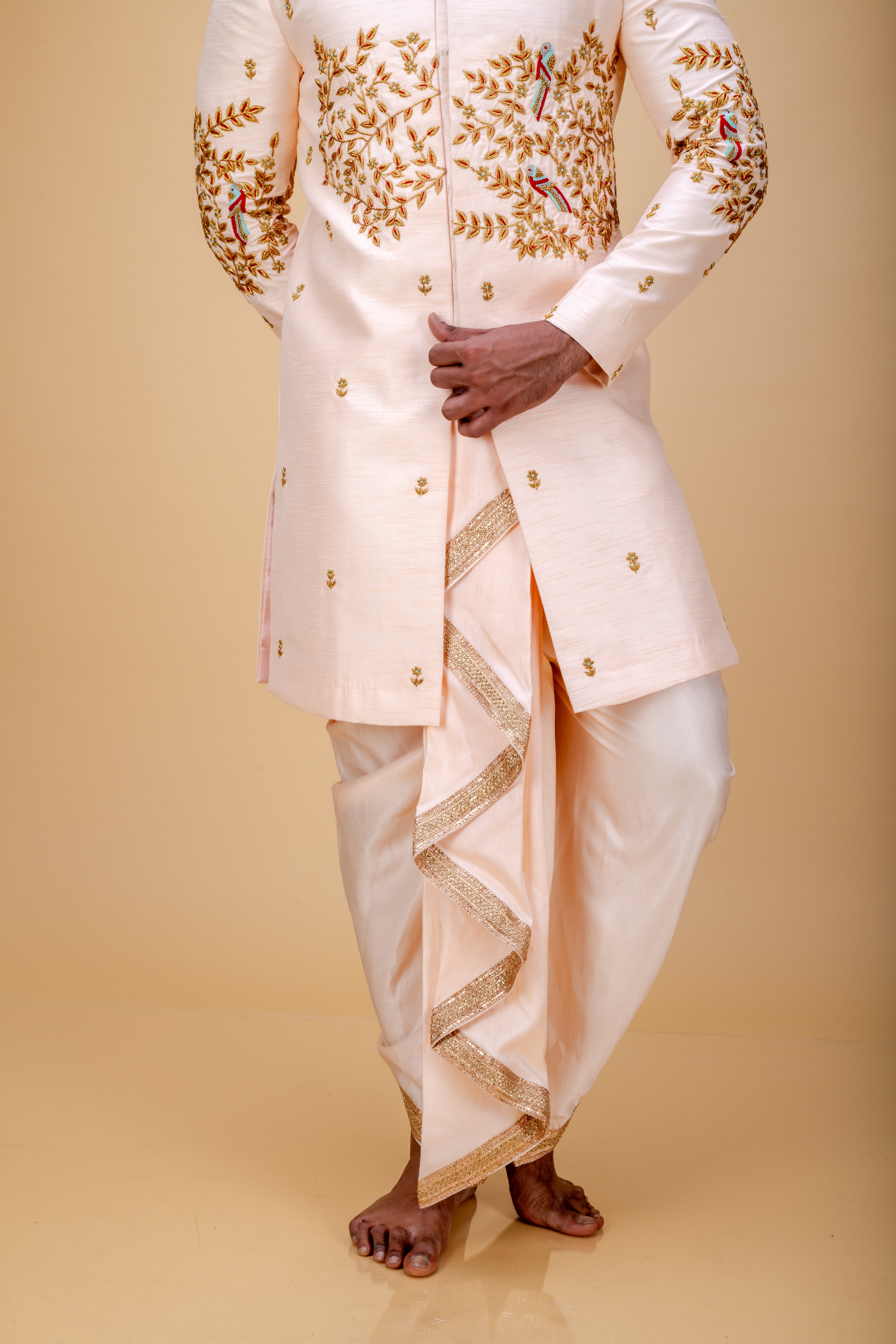 Peach handworked sherwani and dhoti set