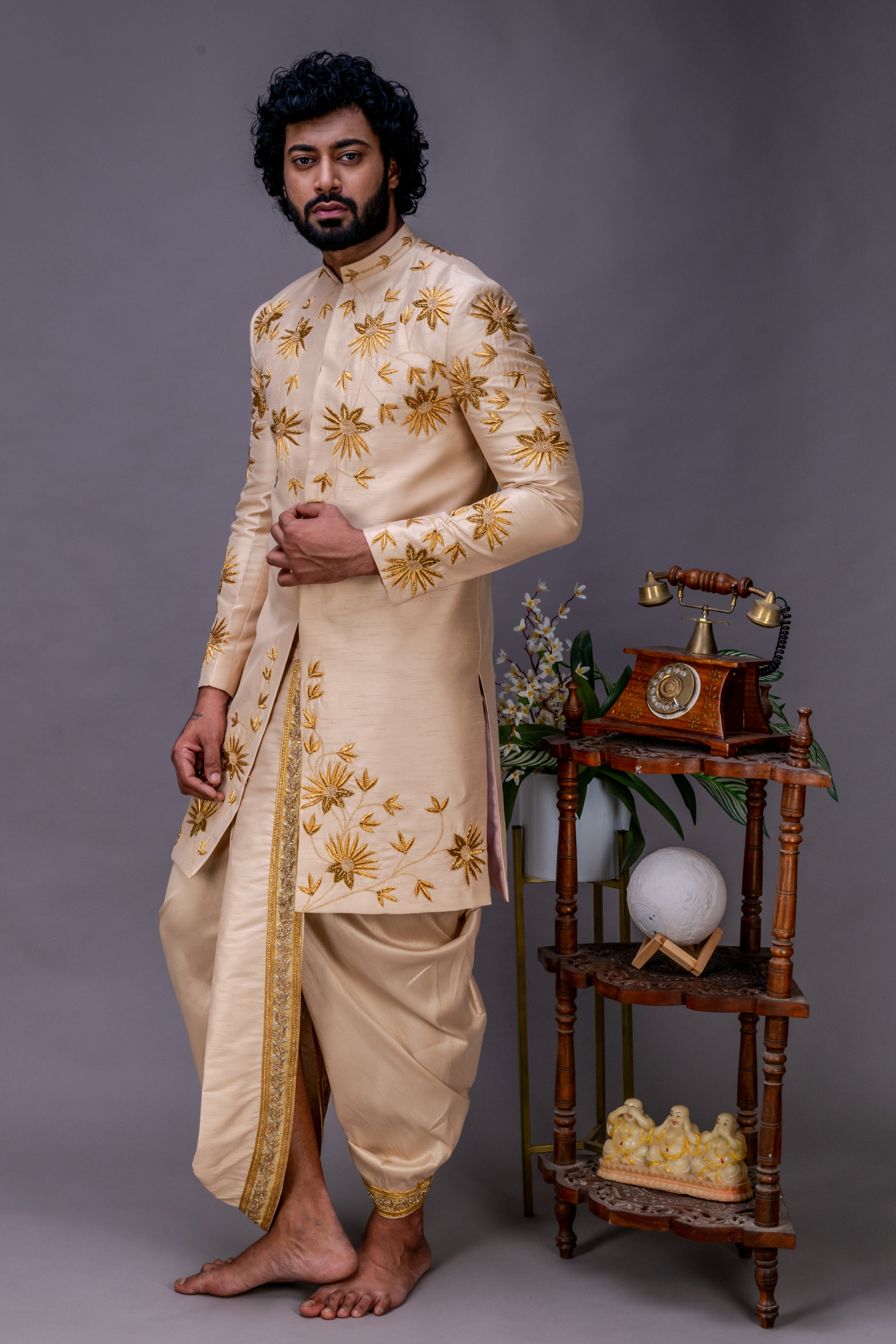 Gold handworked sherwani and dhoti set