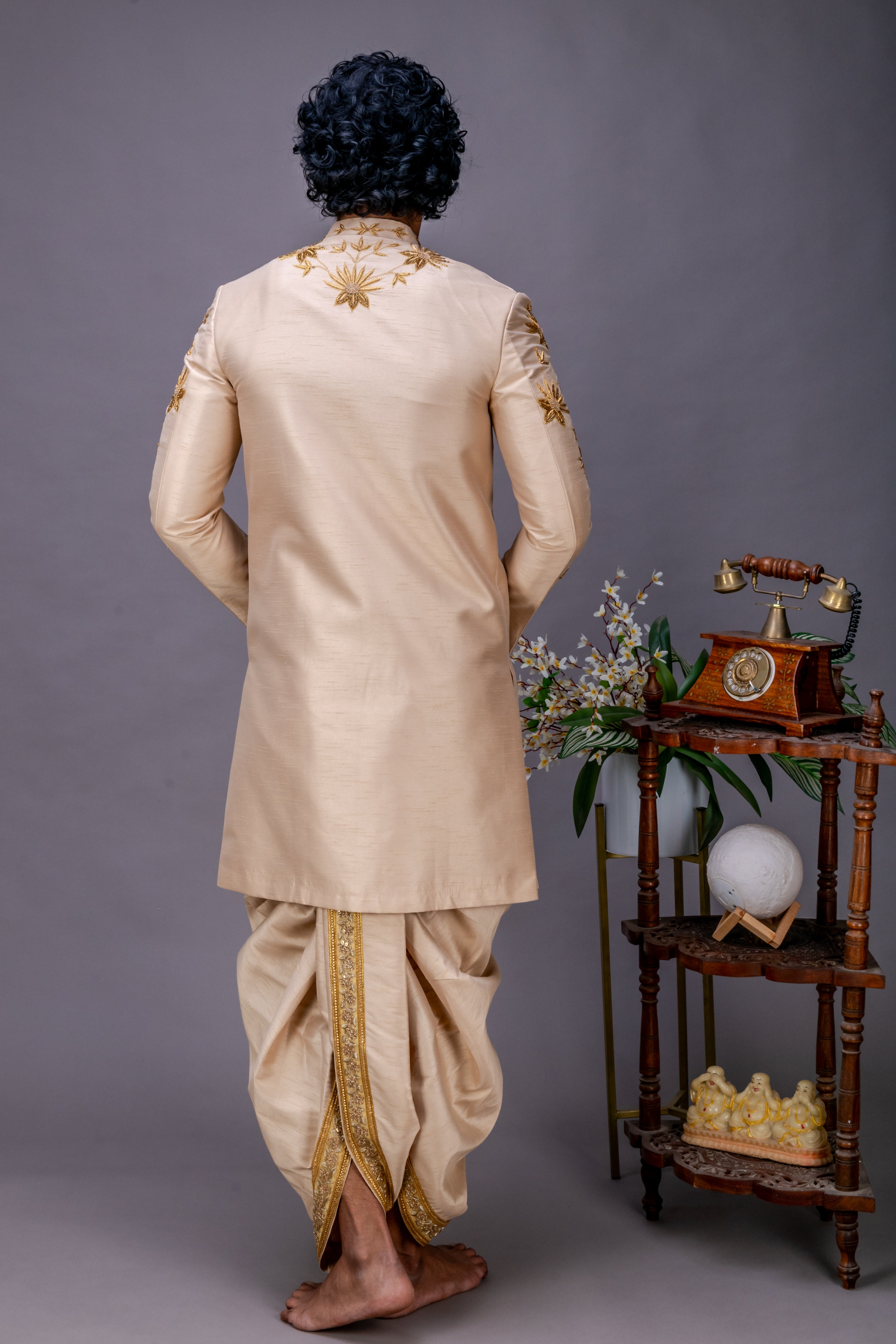 Gold handworked sherwani and dhoti set