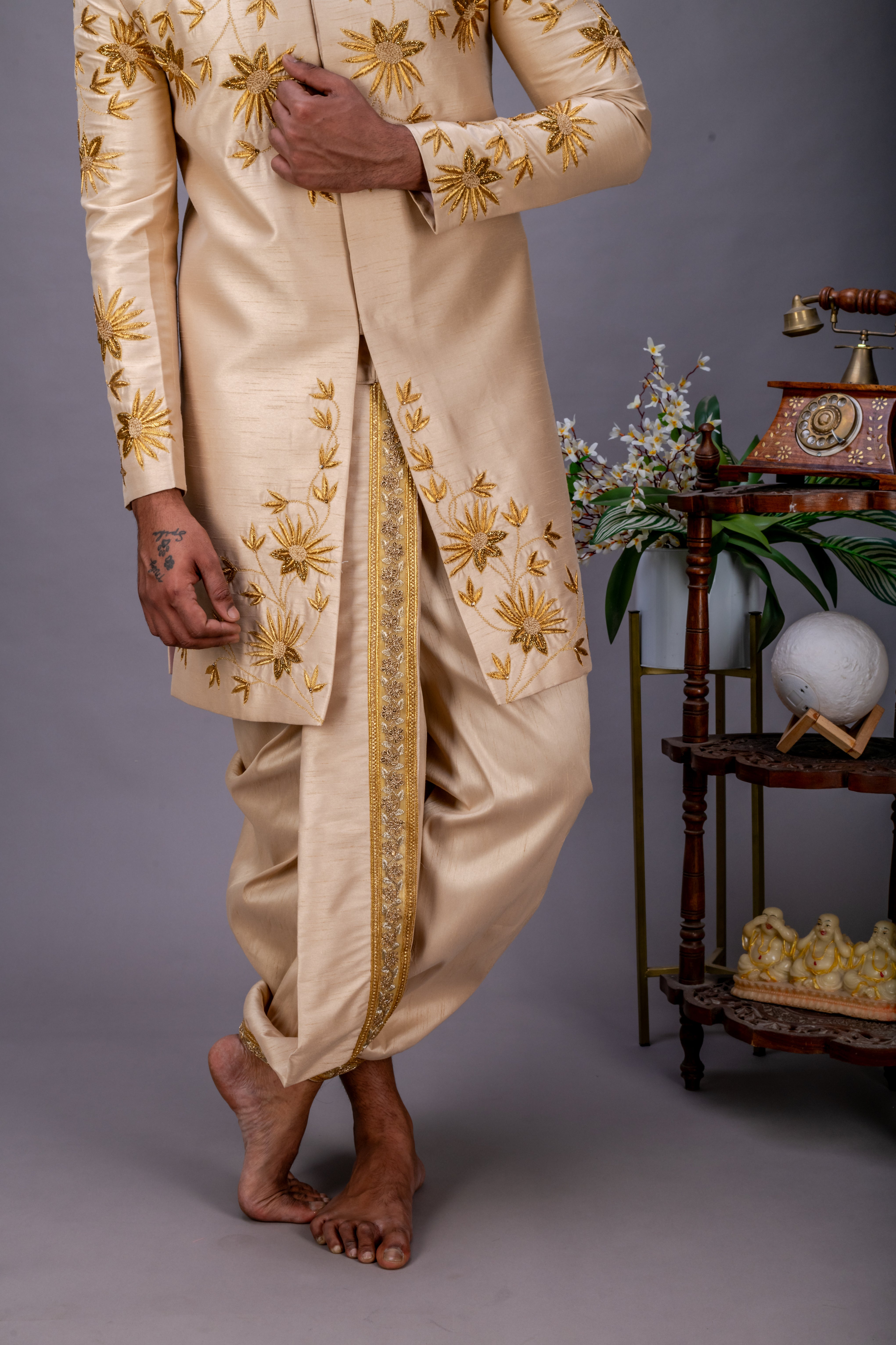 Gold handworked sherwani and dhoti set
