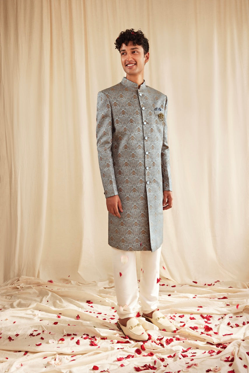 Powder Blue Brocade Sherwani with Golden Motifs – Luxury Wedding & Festive Wear
